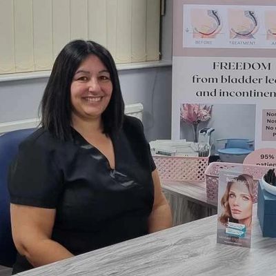 Skin Solutions owner & advanced clinical practitioner and nurse prescribe sitting at reception desk