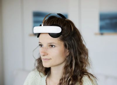 Lady wearing tDCS headset