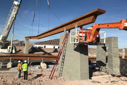 Structural steel on-site mobile welding.  Sick Fab welded the steel beam to the steel plate embeds.