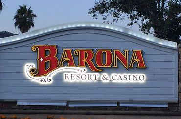 Illuminated Barona Resort & Casino sign at dusk.