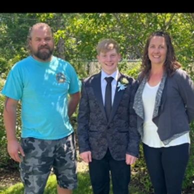 Jake with friends Erin and Jason Enns.