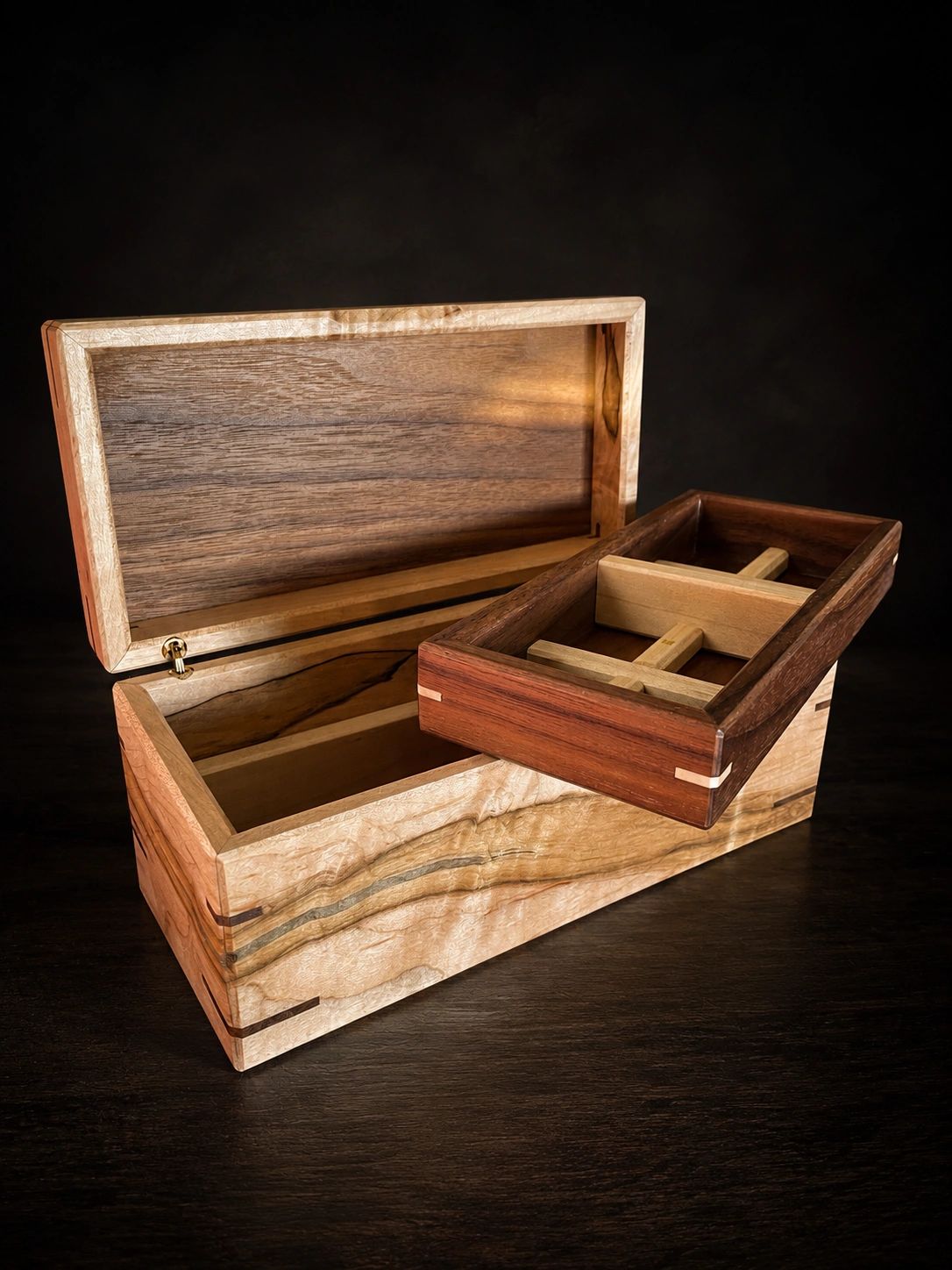 Elegantly crafted wooden box with a removable tray.