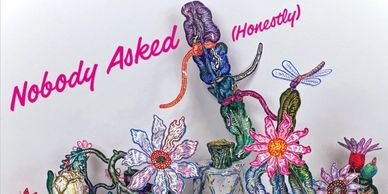 Colorful embroidered flowers with "Nobody Asked (Honestly)" text.