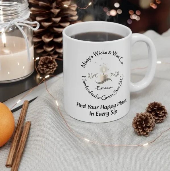 White coffee mug with cozy autumn decor and inspiring text.