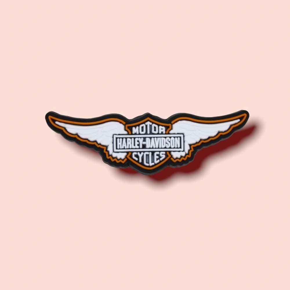 pink harley davidson logo with wings