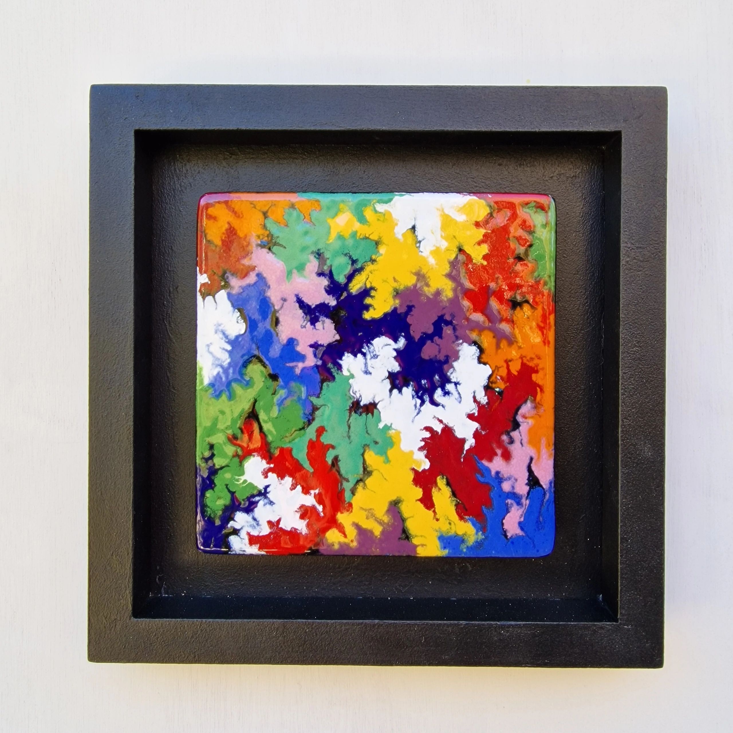 Framed enamel artwork