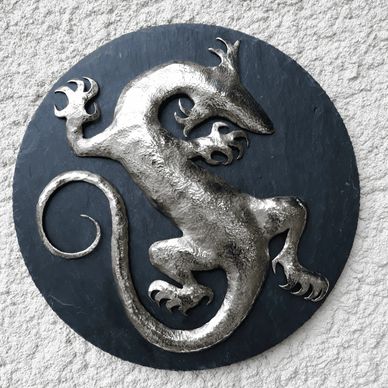 bas-relief salamander in nickle silver wall mounted on slate