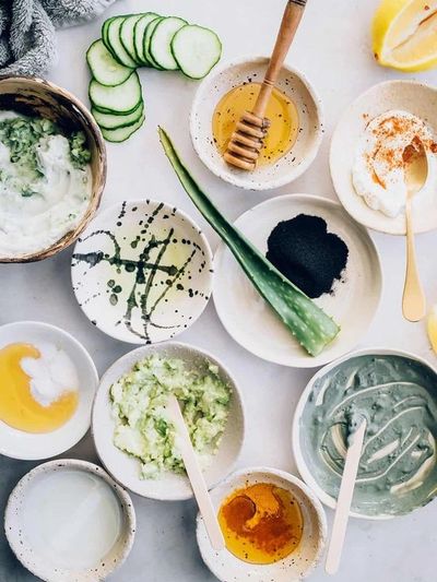 Ingredients and bowls with natural skincare components.