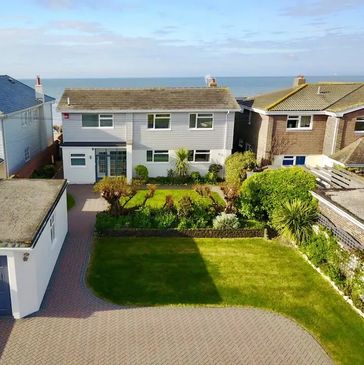 ocean waves West Wittering seafront beach house holiday let. Directly on the sea front.  