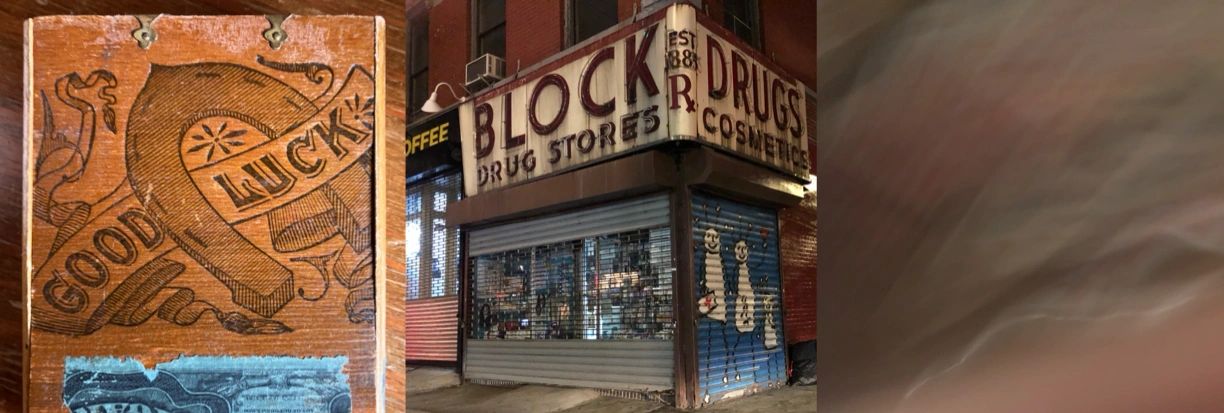 A wooden plaque with 'Good Luck' and a nighttime drugstore storefront.