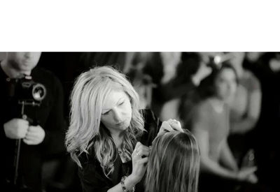 On-set makeup application by professional makeup artist Jenny during film production.