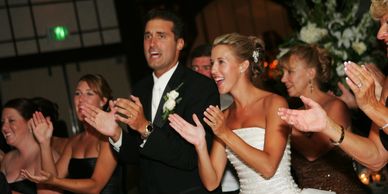 bride and groom cheering