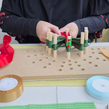 Qribbon Bow Maker invented to help making a ribbon bow from a simple to exclusive bows. 