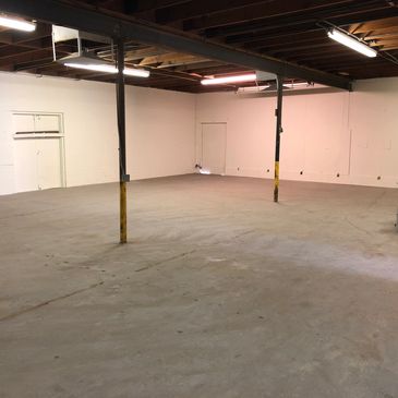 The warehouse is approximately 4000 sq ft with road side loading dock and a 14,000 sq ft yard. 