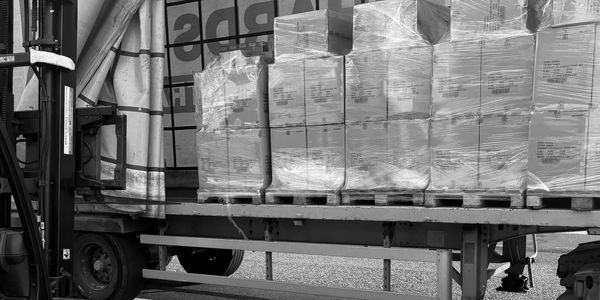 Trailer bering loaded with amazon fba pallets prepped by TGT Distribution. 