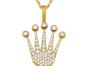 Gold crown pendant necklace adorned with sparkling diamonds.