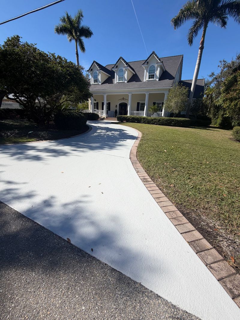 Epoxy driveway coating by B&B Professional Painting - professionally applied concrete coating in Sarasota Florida