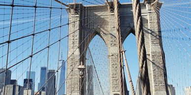 The Brooklyn Bridge is a cable-stayed suspension bridge in New York City, spanning the East River be