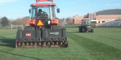 Aerating High Point High School Soccer Field