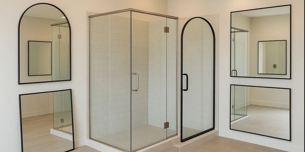 Custom shower doors and mirrors on display 