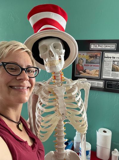 Image of Victoria with a skeleton wearing a hat