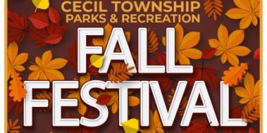 Fall Festival poster with autumn leaves.