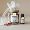 Logique Earth Blends herbal jar and essential oil bottle with decorative pouch.