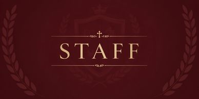 Elegant staff sign with gold lettering on a dark red background.