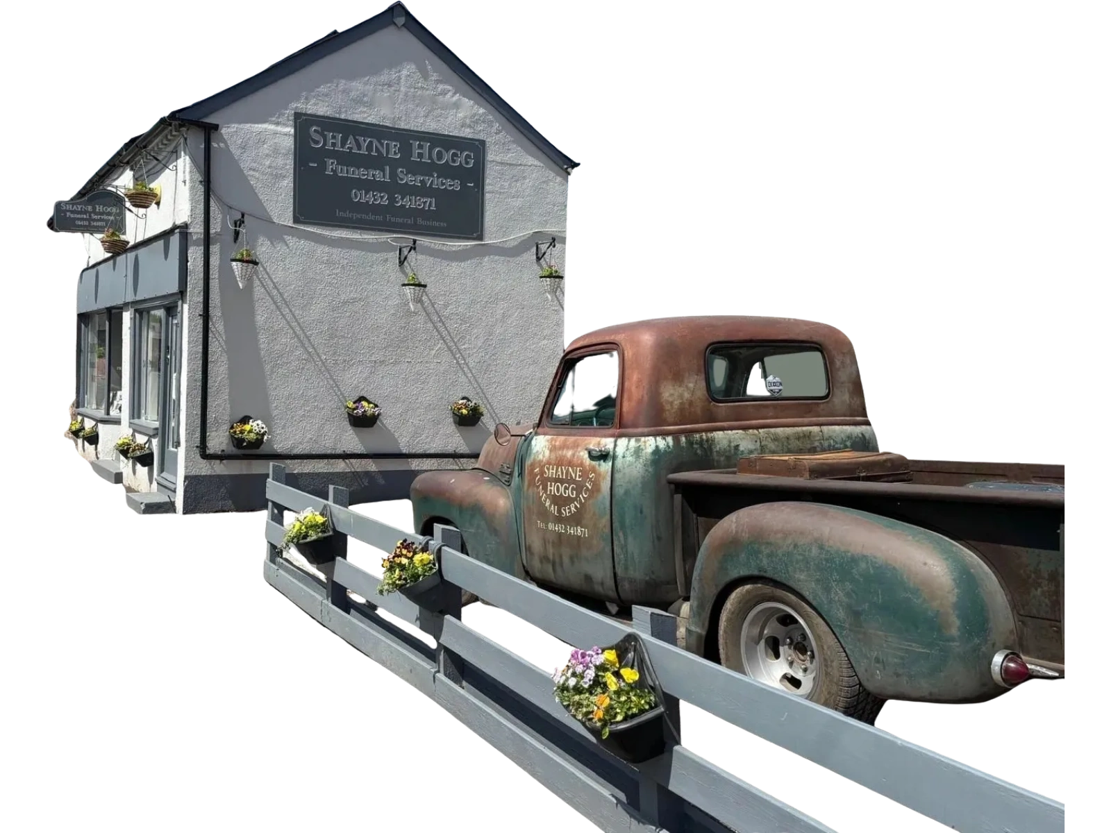 Rustic vintage GMC pickup truck outside Shayne Hogg Funeral Services in Hereford, decorated with flowers for a bespoke funeral tribute.