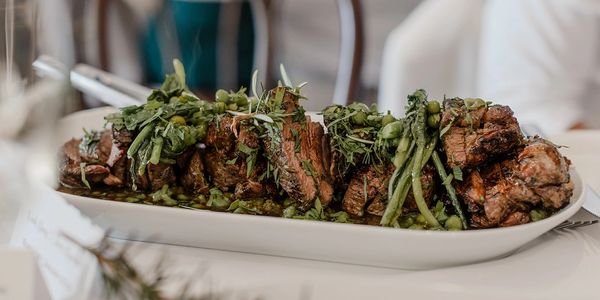 Shared plates promote guest interaction at the table.