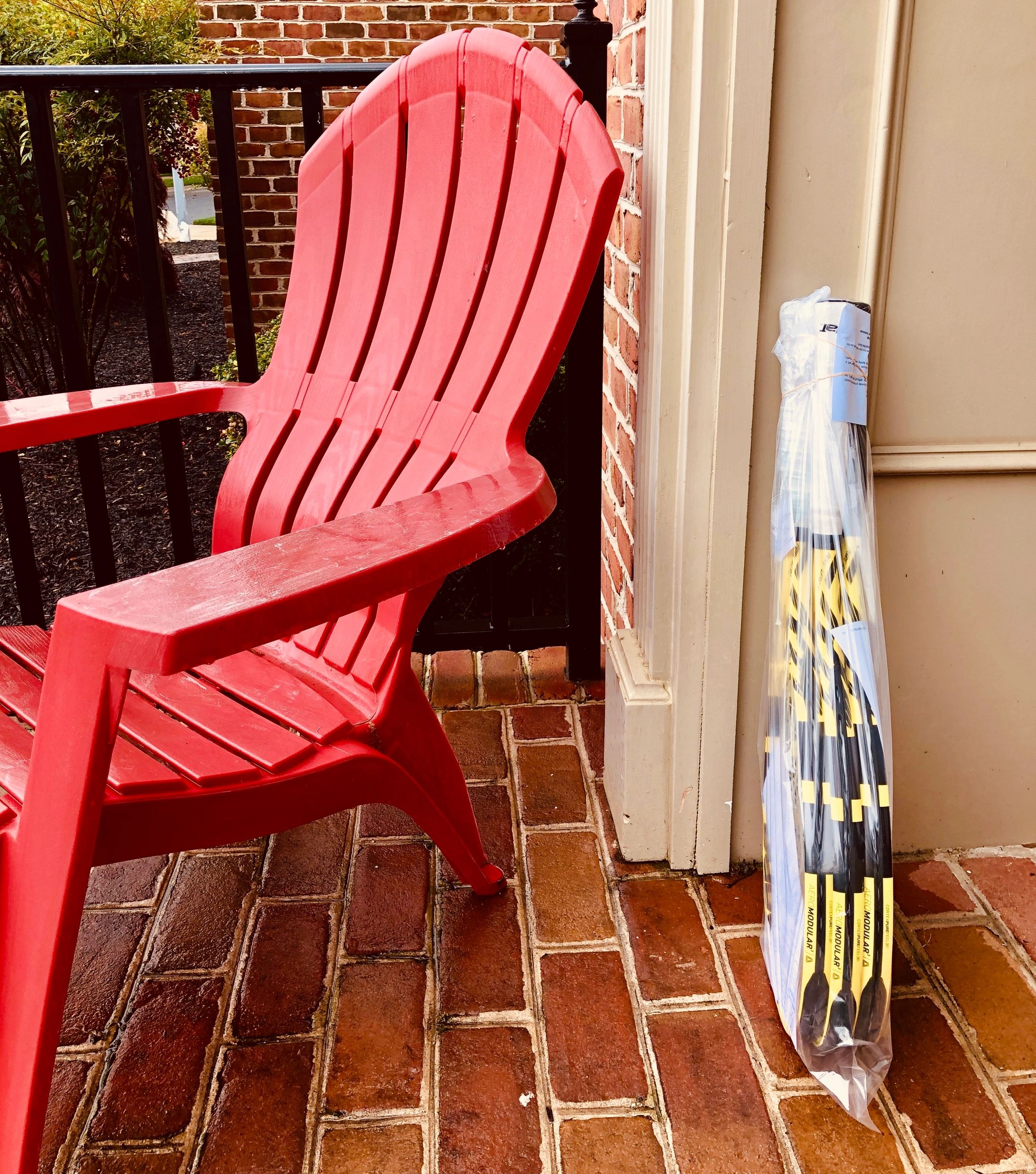 Next to the red chair