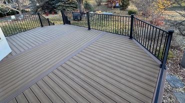 Deckorators decking with steel railings outdoor living in Aurora Colorado. Best custom deck Builder