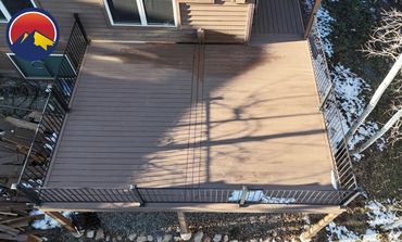 Deckorators deck with steel railings outdoor living in Parker Colorado. Best Composite deck Builder