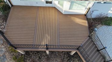 Deckorators decking with steel railings outdoor living in Aurora Colorado. Best custom deck Builder