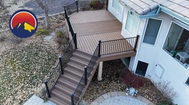Deckorators decking with steel railings outdoor living in Aurora Colorado. Best custom deck Builder