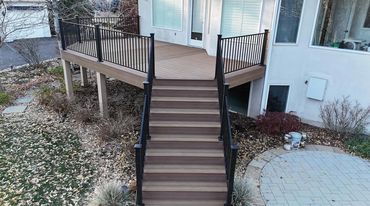 Deckorators decking with steel railings outdoor living in Aurora Colorado. Best custom deck Builder