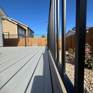 Deckorators deck with steel railings outdoor living in Parker Colorado. Best Composite deck Builder