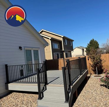 Deckorators deck with steel railings outdoor living in Parker Colorado. Best Composite deck Builder