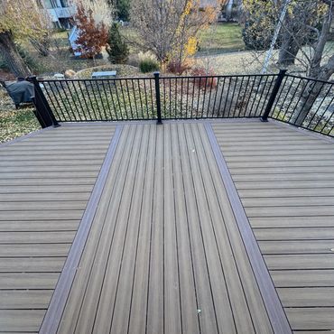 Deckorators decking with steel railings outdoor living in Aurora Colorado. Best custom deck Builder