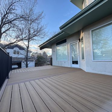 Deckorators decking with steel railings outdoor living in Aurora Colorado. Best custom deck Builder