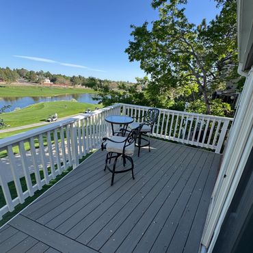 Composite deck with cedar railings in Lone Tree, Co installed by Global Cooperation LLC