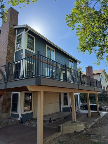 Custom Composite deck with steel railings in highlands ranch, co build by global cooperation llc