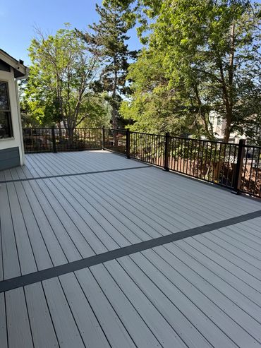 Custom Composite deck with steel railings in highlands ranch, co build by global cooperation llc