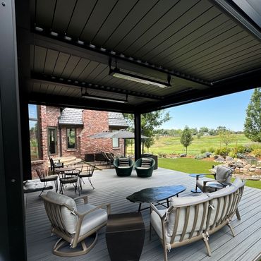 Custom composite deck with steel framing in Cherry Hills, Co with steel pergola for outdoor living