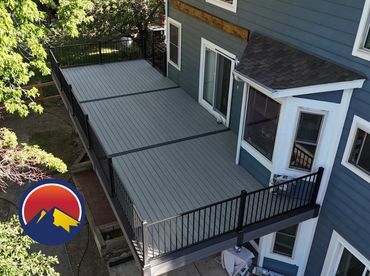 Custom Deckorators composite deck with TimberTech steel railing in Highlands Ranch Colorado