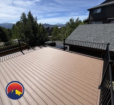 Composite deck replacement with steel railings in Aurora Colorado build by Global Cooperation LLC