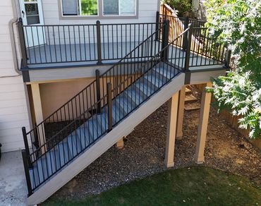 costum composite backyard deck with stairs in highlands ranch,co 