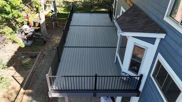 Custom Composite deck with steel railings in highlands ranch, co build by global cooperation llc
