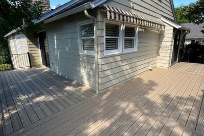 Custom composite deck with steel railings built in Elizabeth, Colorado by Global Cooperation LLC