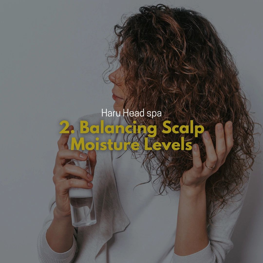 A person with curly hair holds a spray bottle, demonstrating a hair care technique for balancing scalp moisture levels, with text overlay that reads 'Haru Head spa' and '2. Balancing Scalp Moisture Levels.'